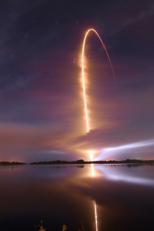 Night time Space shuttle launch captured by time lapse photography